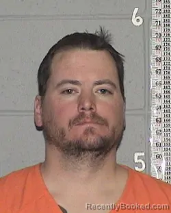 Mugshot of SPENCER JOEL BENSON booked in Flathead County, Montana on March 21, 2026