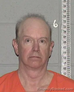 Mugshot of WARREN MARK FISCHBUCH booked in Flathead County, Montana on April 15, 2026