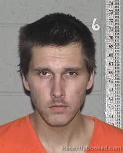 Mugshot of ZACHARY KEITH WEASELTAIL booked in Flathead County, Montana on July 7, 2026
