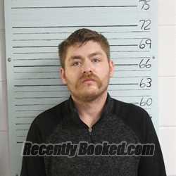 Mugshot of JOSHUA CHARLES BECKER booked in Ravalli County, Montana on May 7, 2026