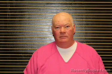 Mugshot of JOHN E WICKUM booked in Toole County, Montana on June 12, 2026