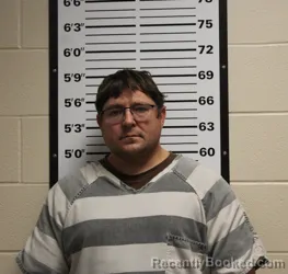 Mugshot of JUSTIN MICHAEL COUGHLIN