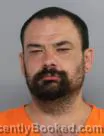 Mugshot of Miguel Drake Daleness booked in Buffalo County, Nebraska on October 8, 2026