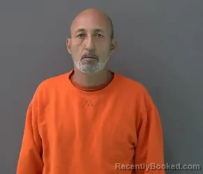 Mugshot of SANTIAGO IVAN BURGOS