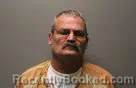 Mugshot of Russell Eugene Peterson booked in Dodge County, Nebraska on August 7, 2026