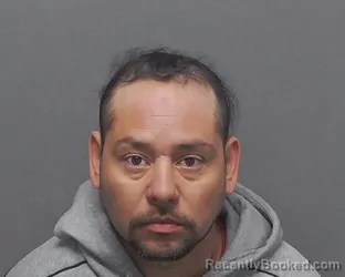 Mugshot of EDGAR E SAN MIGUEL MONTELONGO