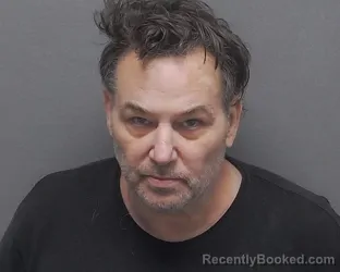 Mugshot of JUSTIN C WALTON