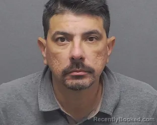 Mugshot of JESUS M JR LINDO