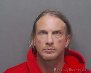 Mugshot of CARL A LEONARD