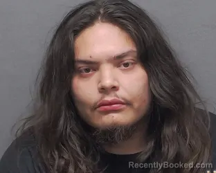 Mugshot of ISAAC T PUTRA