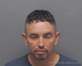 Mugshot of DANIEL E TORRALVA