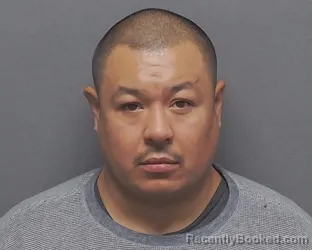 Mugshot of JOSE L FLORES