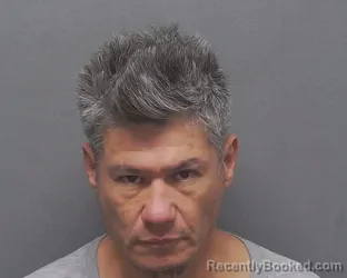 Mugshot of OMAR E BARRIOS