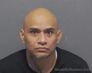 Mugshot of RUDY BARBOSA