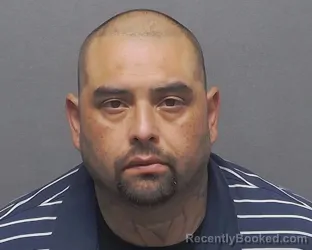 Mugshot of ALBERTO DELGADO