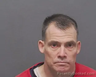 Mugshot of JASON C FLORES