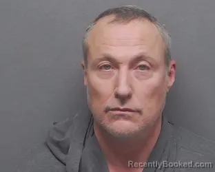 Mugshot of JUSTIN I DEARFIELD