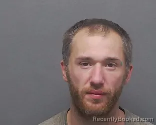 Mugshot of AUSTIN J KADURA