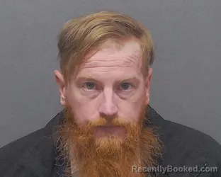 Mugshot of JUSTIN M BOUCHER