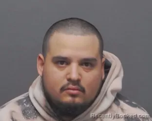Mugshot of MIGUEL A JR PERALTA