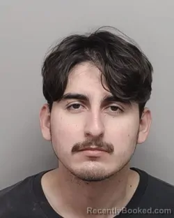 Mugshot of CARLOS A BARBOZA