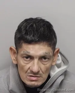 Mugshot of SANTOS R III OLIVA