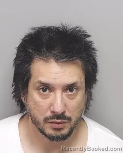 Mugshot of CHRISTIAN M NAVARRO booked in Bexar County, Texas on March 7, 2026