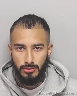 Mugshot of JOHNNY A ALONZO booked in Bexar County, Texas on March 10, 2026