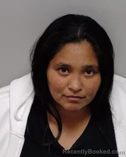 Mugshot of MUNEQUITA D BARRERA booked in Bexar County, Texas on March 12, 2026