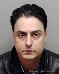 Mugshot of IMAN MOMENNASAB booked in Bexar County, Texas on March 14, 2026