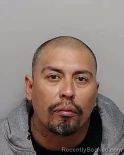 Mugshot of MARTIN JR LLAMAS booked in Bexar County, Texas on March 14, 2026