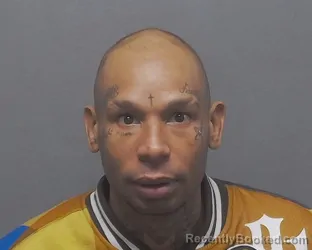 Mugshot of MAVERICK DENNIS ENIS booked in Bexar County, Texas on March 16, 2026