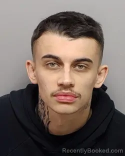 Mugshot of ETHAN L DEVILBISS booked in Bexar County, Texas on April 1, 2026