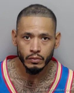 Mugshot of MICHAEL A JUN GONZALES booked in Bexar County, Texas on April 2, 2026