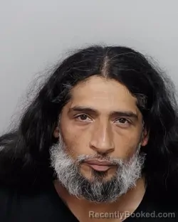 Mugshot of ROBERTO M JR REYNA booked in Bexar County, Texas on April 4, 2026