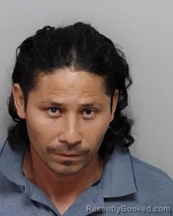 Mugshot of OLBIN O BUSTILLO MENDOZA booked in Bexar County, Texas on April 4, 2026