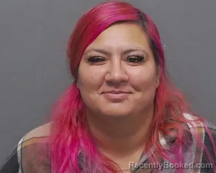 Mugshot of CHRISTINA PESINA-MORENO booked in Bexar County, Texas on May 21, 2026