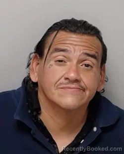 Mugshot of JON B GARZA booked in Bexar County, Texas on May 23, 2026