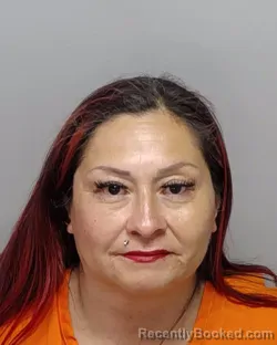Mugshot of ELAINE M MARTINEZ booked in Bexar County, Texas on May 24, 2026