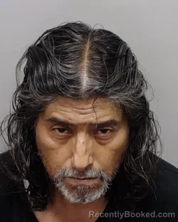 Mugshot of AMBROSIO C JR FLORES booked in Bexar County, Texas on July 18, 2026