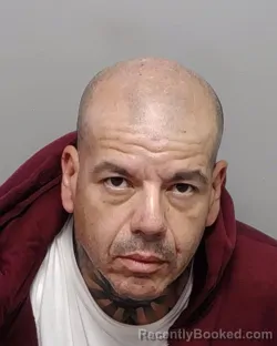 Mugshot of B D Reyna booked in Bexar County, Texas on July 27, 2026