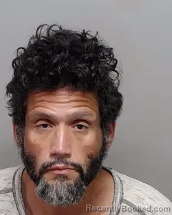 Mugshot of T Jr Bustos booked in Bexar County, Texas on July 28, 2026