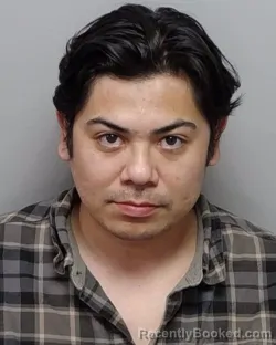 Mugshot of O A Cruz Talonia booked in Bexar County, Texas on July 29, 2026