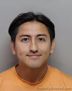 Mugshot of R Gomez Beltran booked in Bexar County, Texas on August 4, 2026