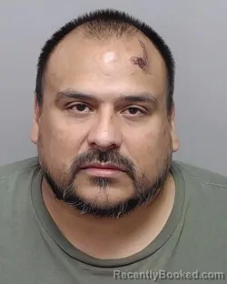 Mugshot of R Jimenez booked in Bexar County, Texas on September 14, 2026