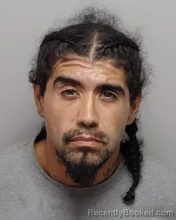 Mugshot of R Garcia booked in Bexar County, Texas on September 15, 2026