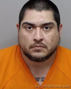 Mugshot of R Delagarza booked in Bexar County, Texas on September 18, 2026