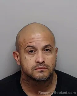 Mugshot of M Q Bueno booked in Bexar County, Texas on September 19, 2026
