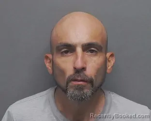 Mugshot of J Cortez booked in Bexar County, Texas on September 20, 2026
