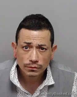Mugshot of G De La Cruz booked in Bexar County, Texas on September 28, 2026